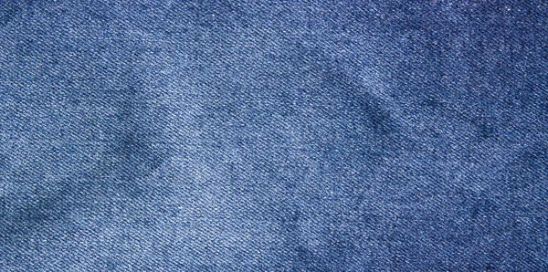 Classic jeans fabric. Blue background, denim jeans texture. — Stock Photo, Image