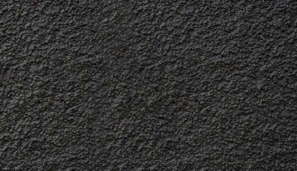 Nuevo primer plano de asfalto. Fondo negro o textura . — Foto de Stock