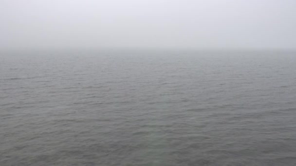 Morning calm water surface with fog, looped video. — Stock Video