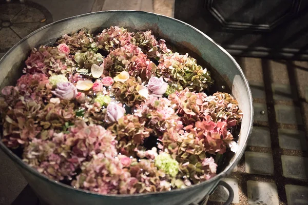 Metal tubs filled with summer flowers — Stock Photo, Image