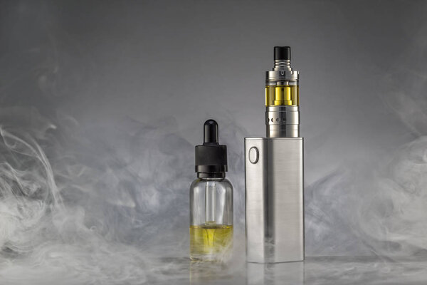 electronic cigarette over a gray background