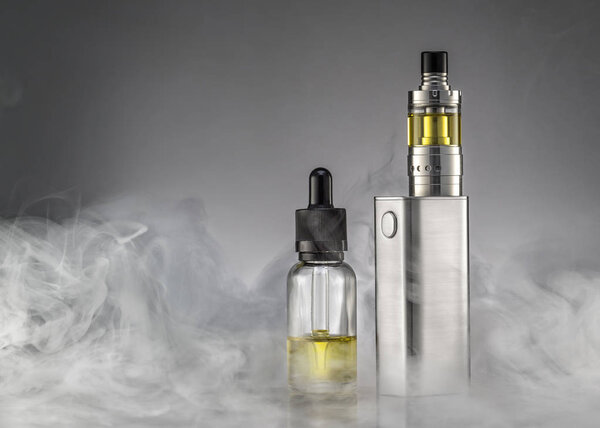 electronic cigarette over a gray background