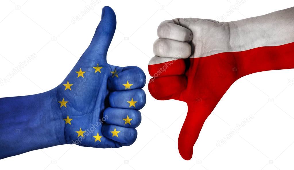  Hand with thumb up and down with the EU and Polisch flag painted.  Symbol of Polexit and crisis in european union. Poland wants to leave the union.