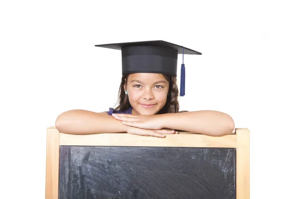 Girl leaning on blackboard — Stock Photo, Image