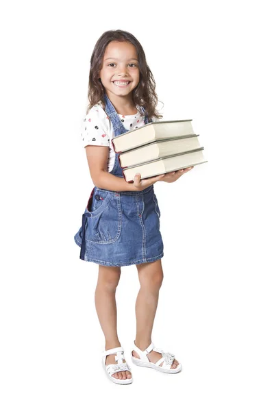 Yung menina segurando pilha de livros — Fotografia de Stock