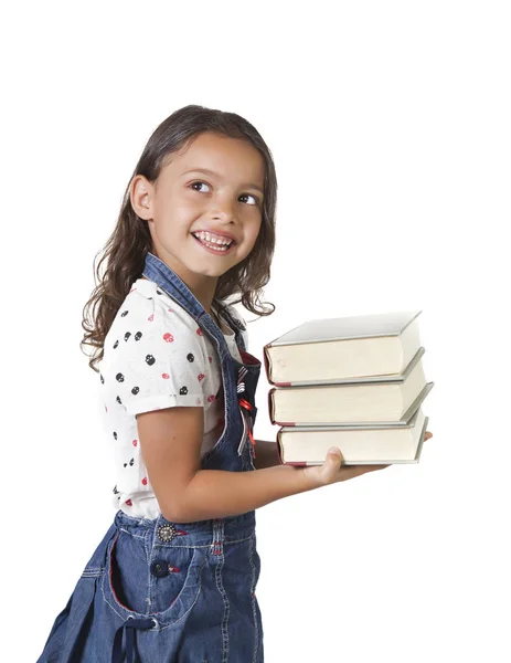 Yung flicka håller trave böcker — Stockfoto