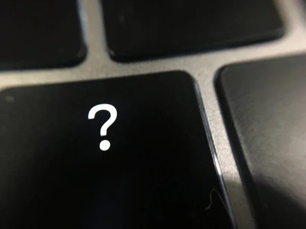 Question mark at the computer key
