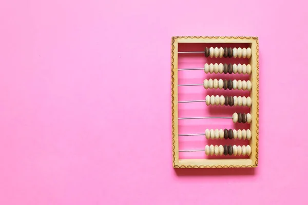 Ábaco Madera Sobre Fondo Rosa Dispositivo Cálculo Anticuado Foto Con — Foto de Stock