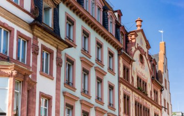 Decorated facades of old houses in on the market square of Mainz, Germany clipart