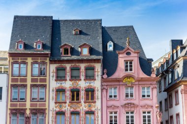 MAINZ, GERMANY - AUGUST 04, 2019: Colorful old buildings on the Markt square of Mainz, Germany clipart