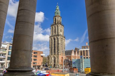 Pillars of the town hall and the Martini tower in Groningen, Netherlands clipart
