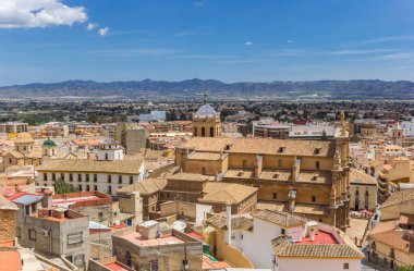 View over historic city Lorca and the surrounding mountains in Spain clipart