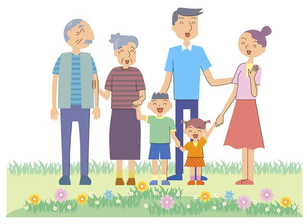 Bahçede gülümseyen üç kuşak aile