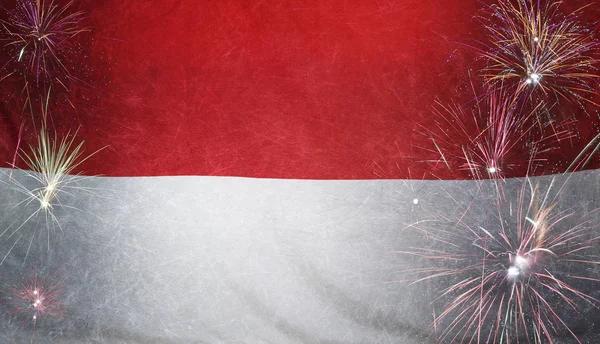 Indonézia zászló tűzijáték Grunge koncepció valódi szövet Stock Kép