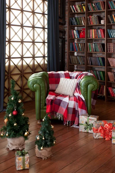 Fir tree in a room with library — Stock Photo, Image