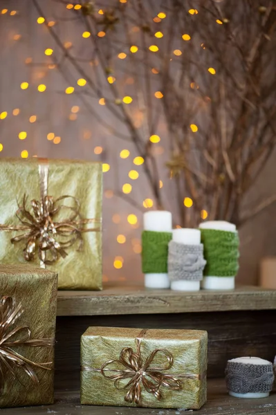 Golden gift boxes on abstract background