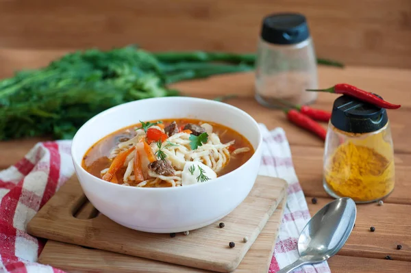 Asian traditional soup lagman with noodle and meat — Stock Image Asian traditional soup lagman with noodle and meat Royalty Free Stock Images