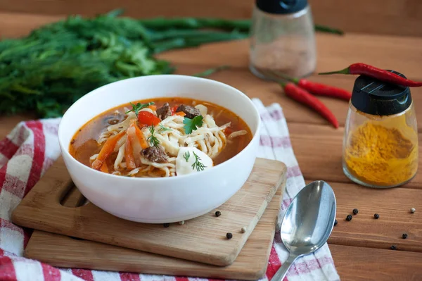 Asian traditional soup lagman with noodle and meat — Stock Image Asian traditional soup lagman with noodle and meat Stock Photo