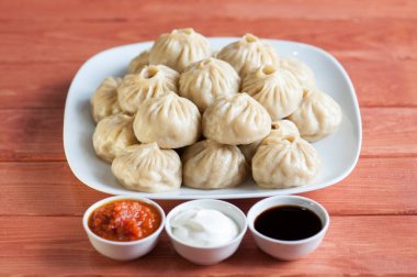 Buuza poza bir Buryat Moğol ulusal, Yapıştır paket yemektir