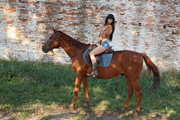 The girl rider — Stock Photo, Image