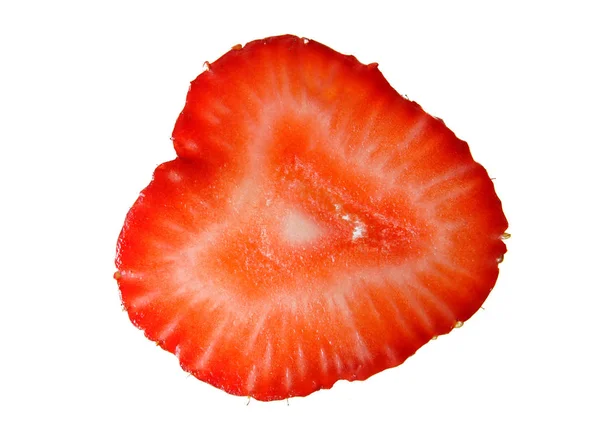 Skär en jordgubbe närbild. — Stockfoto