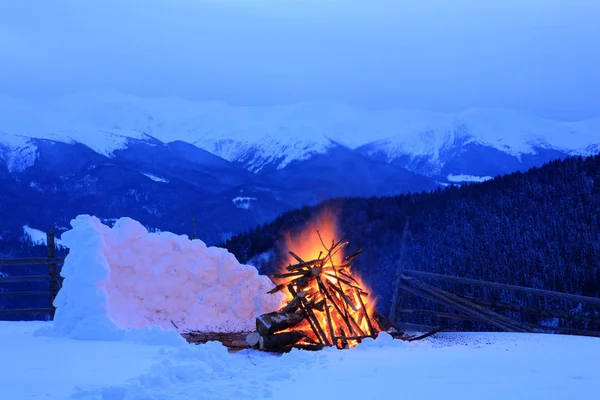 Fire in the mountains in winter