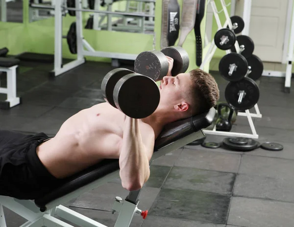 The young man in the gym