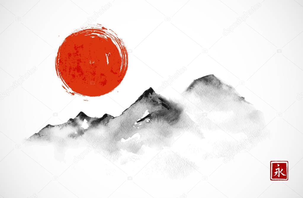 Mountains and red sun