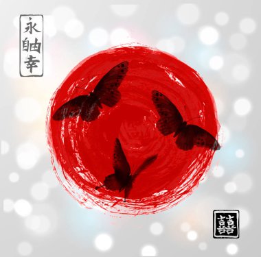 Büyük kırmızı güneş ve üç siyah kelebekler