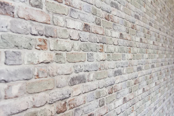Ornamental brick wall forms part of interior in house inside