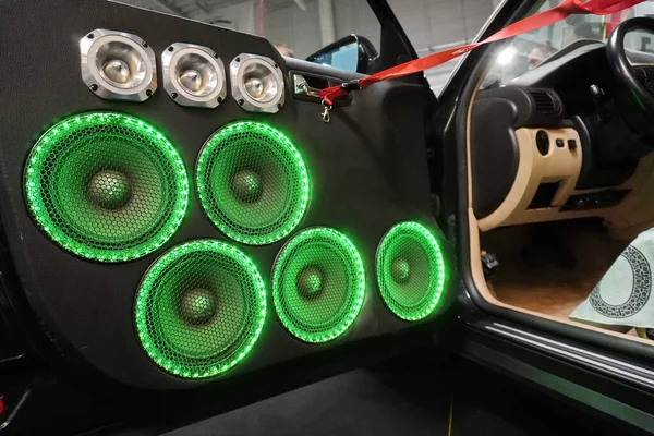 Speakers in the car door, customization, handmade. green speaker backlight. music lovers, lovers of good sound. — Stock Photo, Image