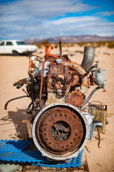 Old rusty engine in a Mojave desert junkyard
