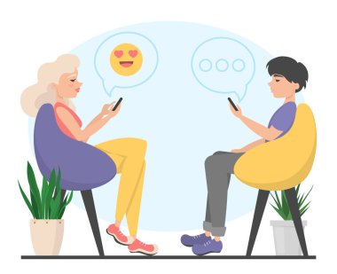 Kadın ve erkek sandalyede oturup sohbet ediyorlar.