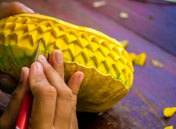 Thailand carved pumpkin with hand