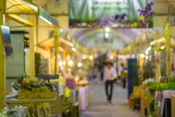 Kleurrijke achtergrond wazig beelden in de avondmarkt in de certificeringsinstantie — Stockfoto