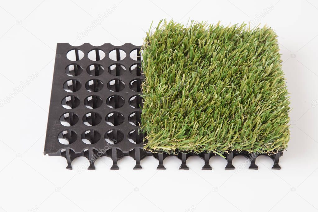 artificial grass mat isolated on a white background