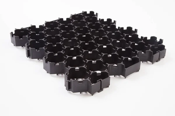 Eğimin Tasarımı Plastik Siyah Bal Peteği Çerçevesi Dolduruldu — Stok fotoğraf