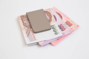 A leather money clip  on the white background