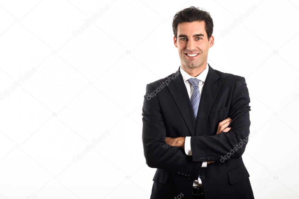 Businessman wearing blue suit and tie on white background.