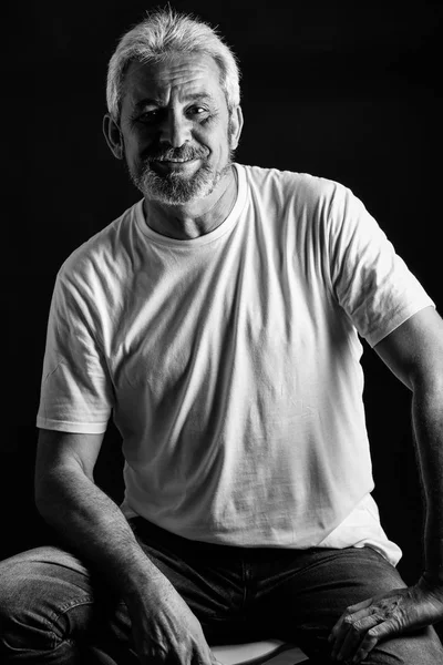 Mature man with white hair and beard smiling — Stock Photo, Image