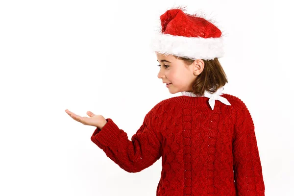 Αξιολάτρευτο κοριτσάκι που φοράει καπέλο santa που απομονώνονται σε λευκό backgro — Φωτογραφία Αρχείου