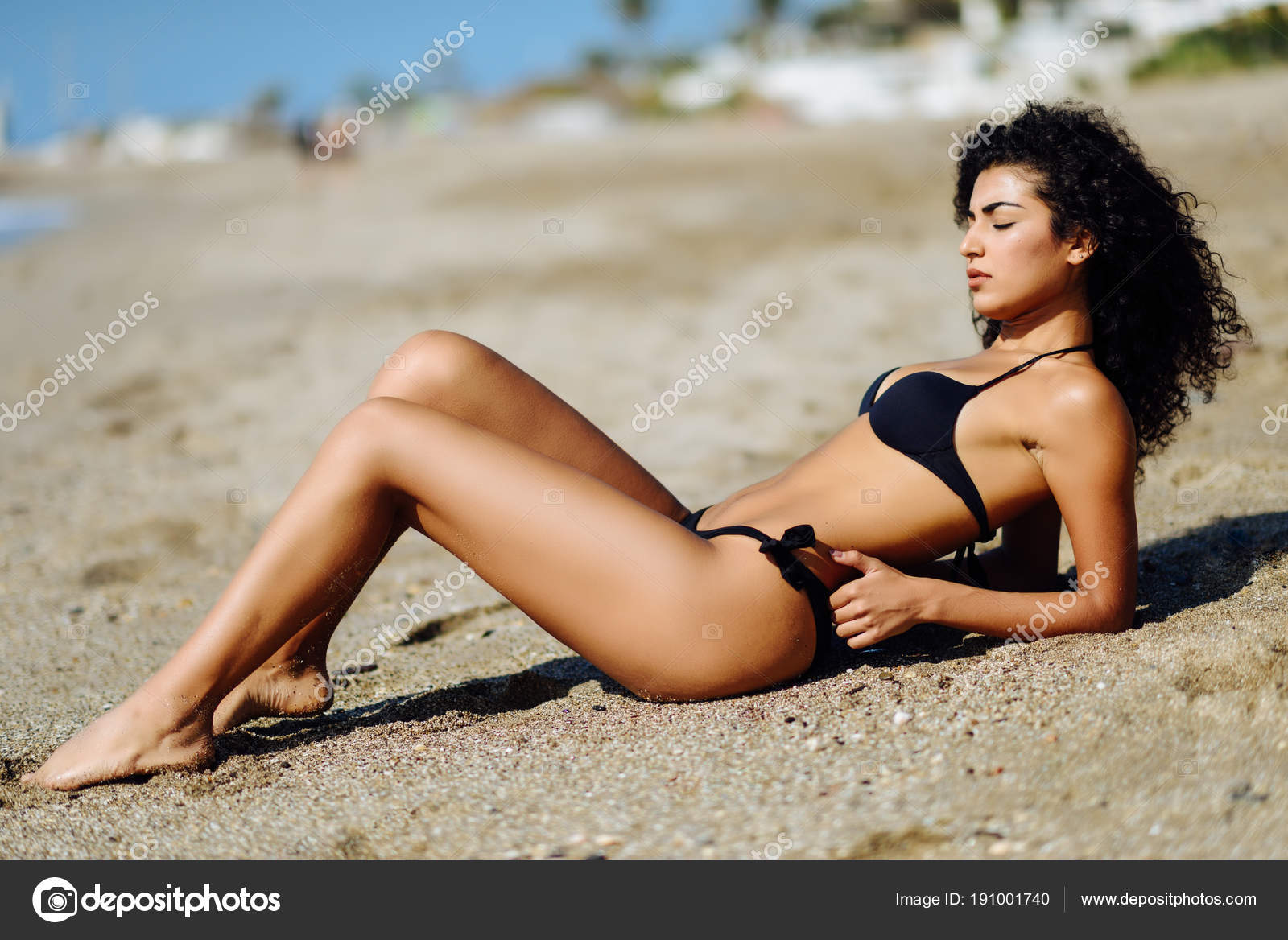 Young Arabic Woman With Beautiful Body In Swimwear Smiling On A