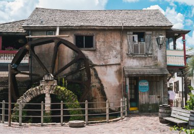 Saint Augustine, Florida, United States - July 19 2012: Old Water Mill in the Historic Colonial Quarter of St. Augustine with well known Restaurant Milltop Tavern.