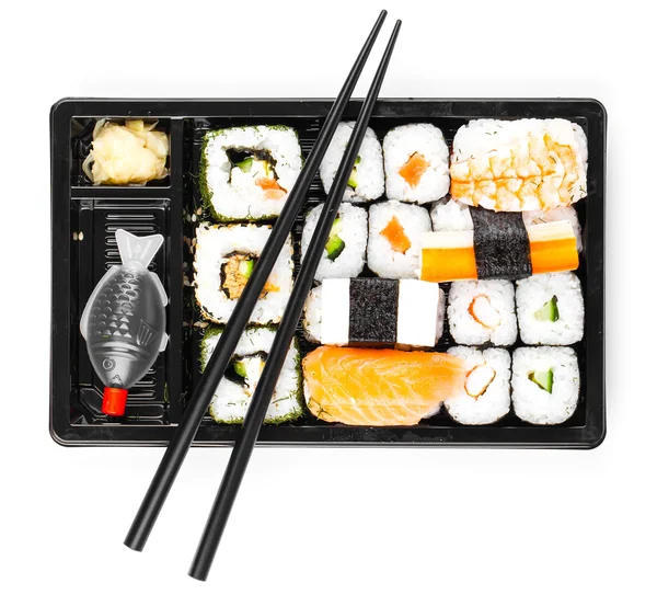 Sushi menu in black transport box close up isolated on white bac — Stock Photo, Image