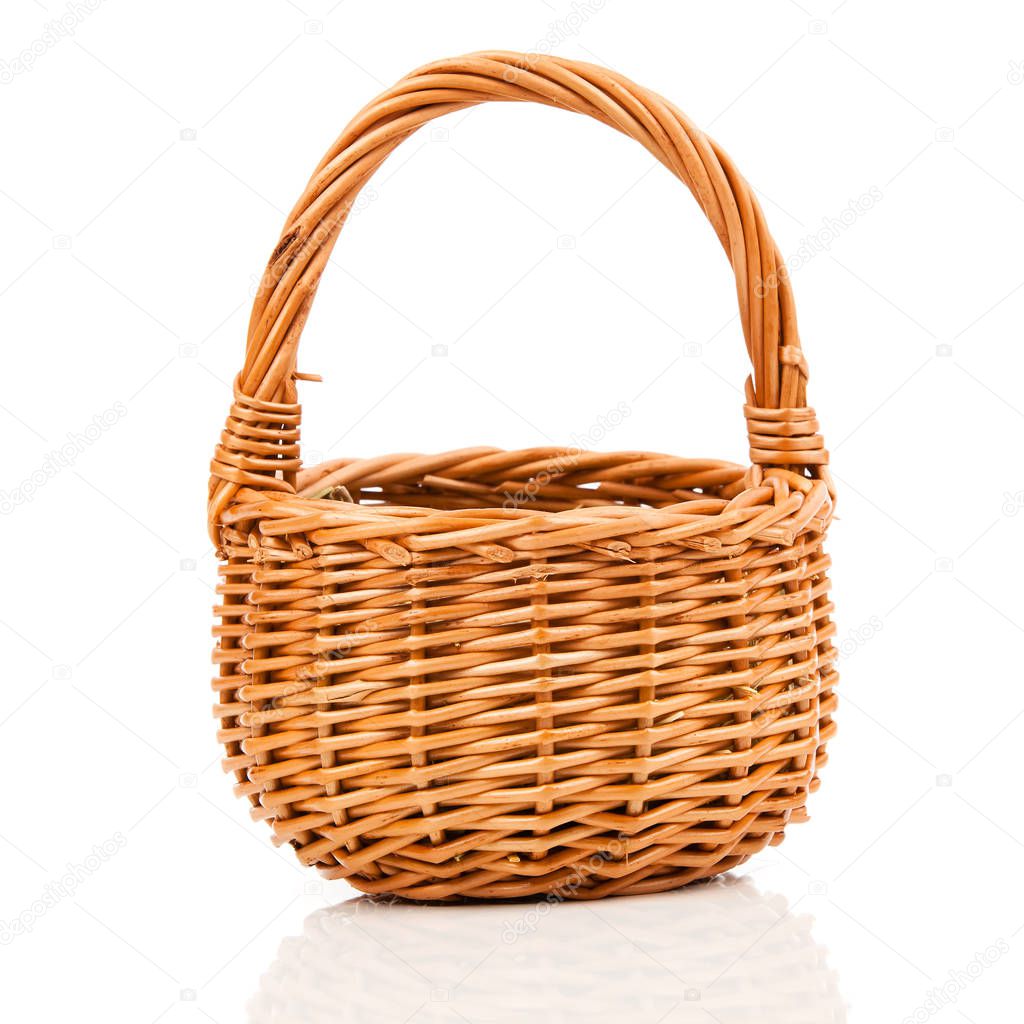 empty wicker basket on white background
