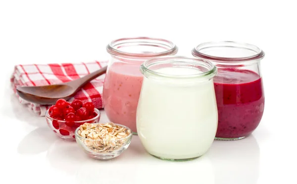 Delicious, nutritious and healthy yogurt in a glass jars with sp — Stock Photo, Image