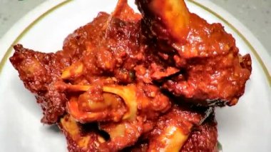 Sup Tulang Merah which is a spicy mutton bone marrow dish originated in Singapore