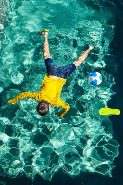 Body of a boy in the pool — Stock Photo, Image