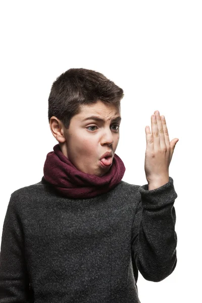 Boy watches the palm of his hand — Stock Photo, Image