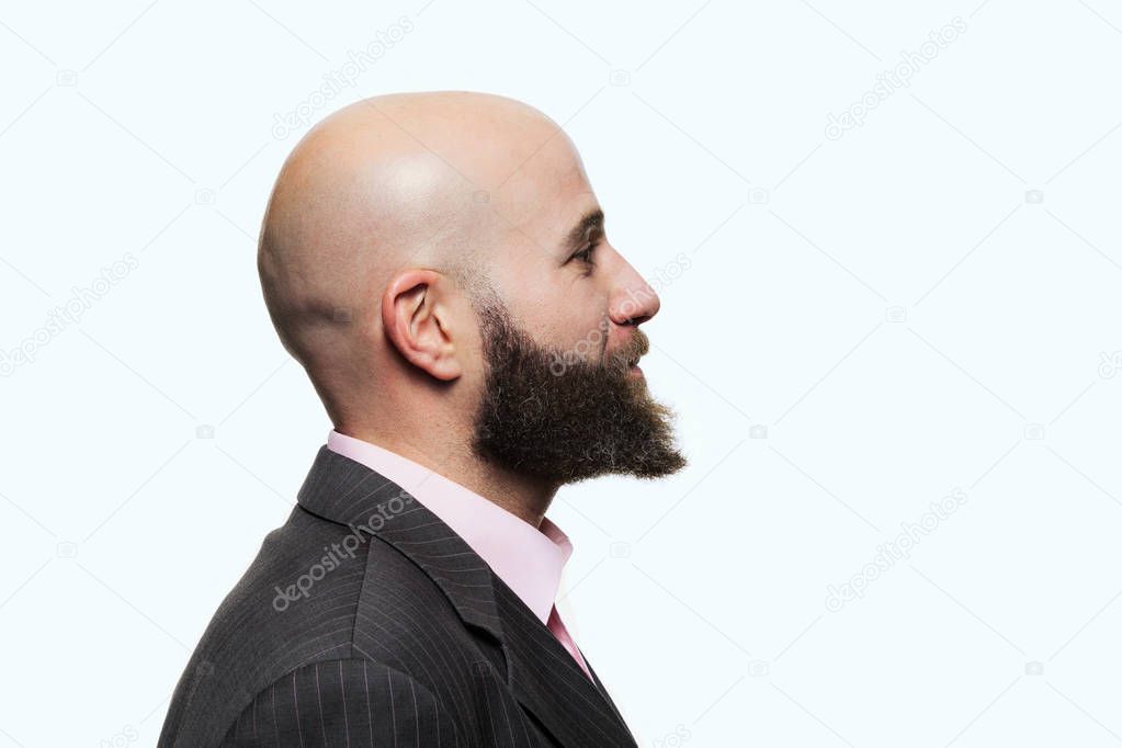 Young bald man with a beard